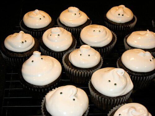 Chocolate cupcakes with ghost frosting and eyeballs